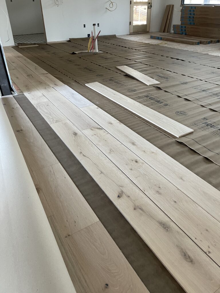 Engineered Hardwood Floors being installed.