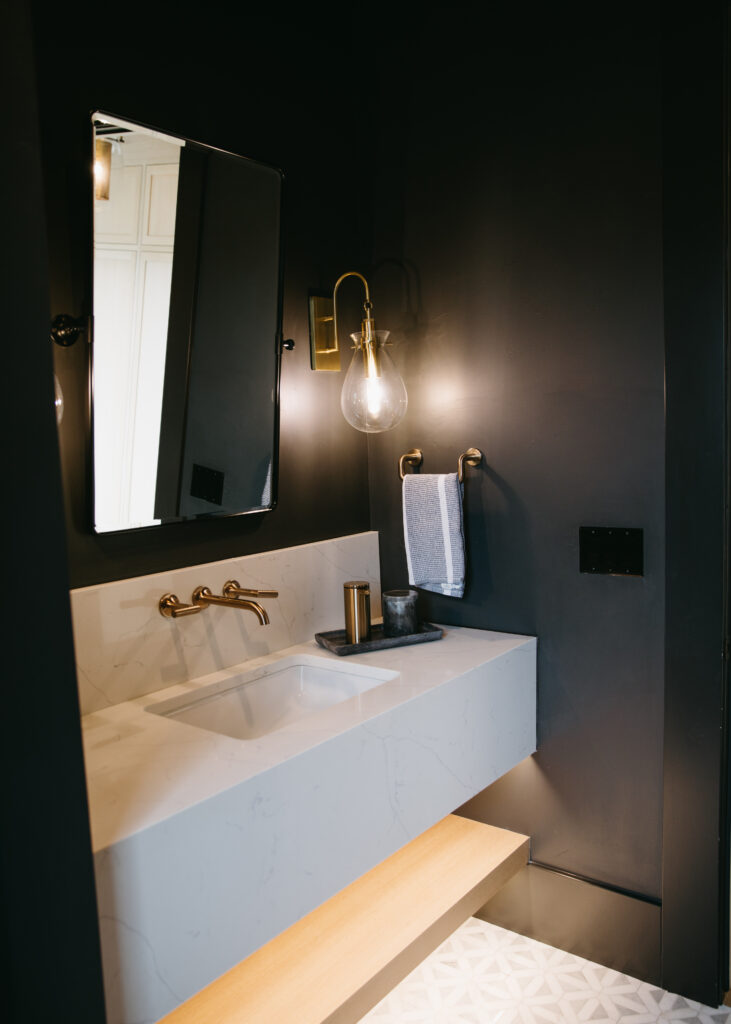 Custom bathroom layout with dividing wall and
floating vanity